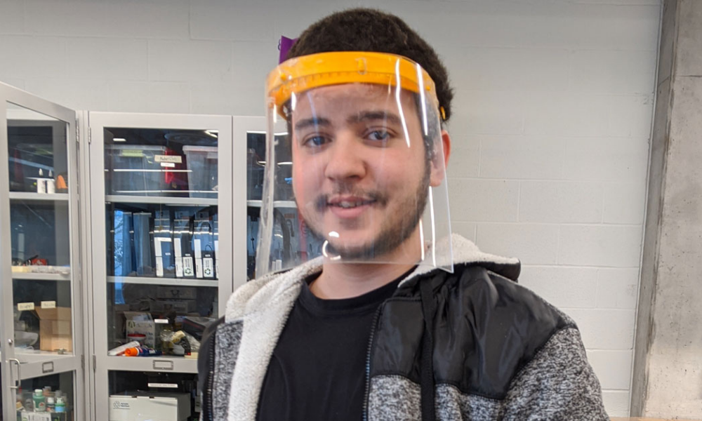 Volunteer wearing face shield