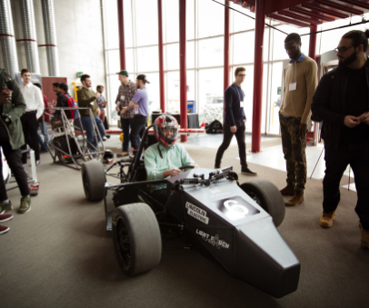 A student presenting his project for the competition